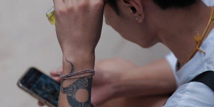 Later payments, higher spending are hurting cash flow, AT&T says