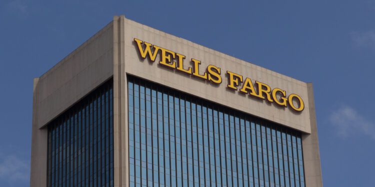 Wells Fargo exceeds expectations, sets earnings aside for loan losses
