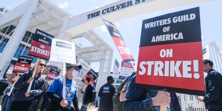 Writers guild to reopen negotiations with studios