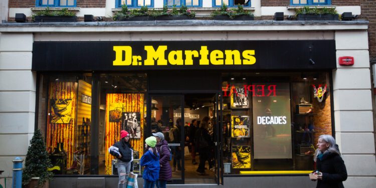 Dr Martens stock hits record low following revised revenue guidance