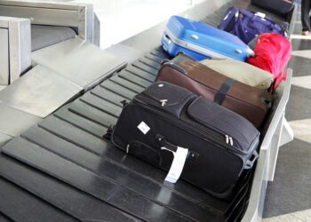 American Airlines ups checked bag fee