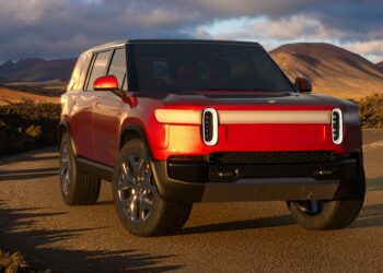 Rivian hits record revenue, expects future losses