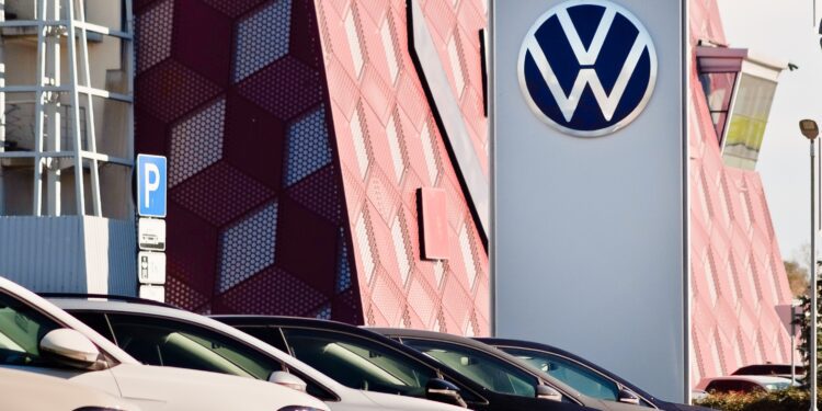 Volkswagen takes $1.5 billion tariff hit, lowers guidance