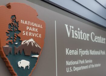 Environmental group sues in bid to get Trump’s image removed from new national park passes