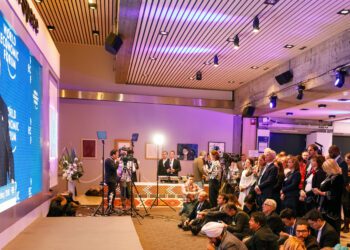 Trump issues Greenland warning, takes swipe at Carney in Davos speech