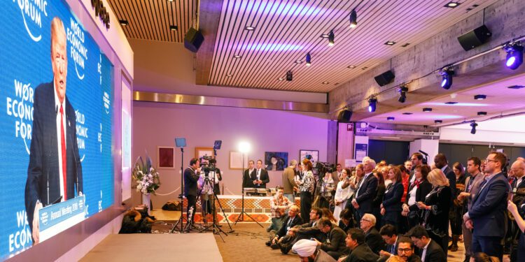 Trump issues Greenland warning, takes swipe at Carney in Davos speech