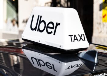 Rivian shares jump as Uber invests $1.25 billion in robotaxi deal